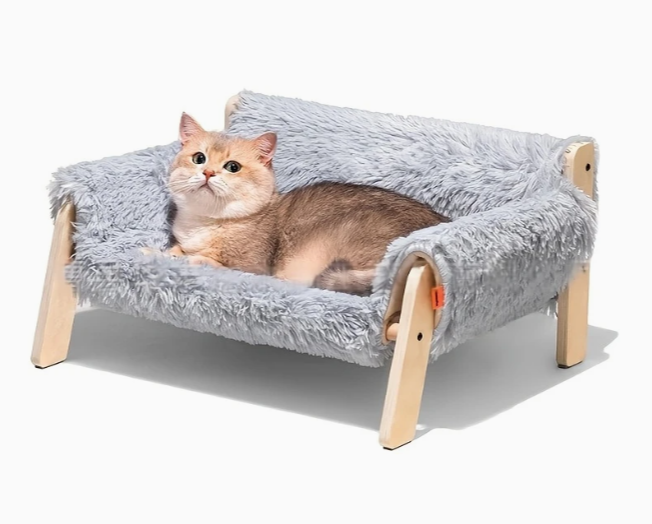 De lounge met zacht, lichtgrijs kussen voor kleine huisdieren.