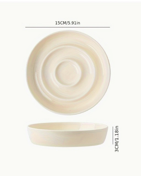 Keramische antischrok voerbak met spiraaldesign in zachte crème kleur.