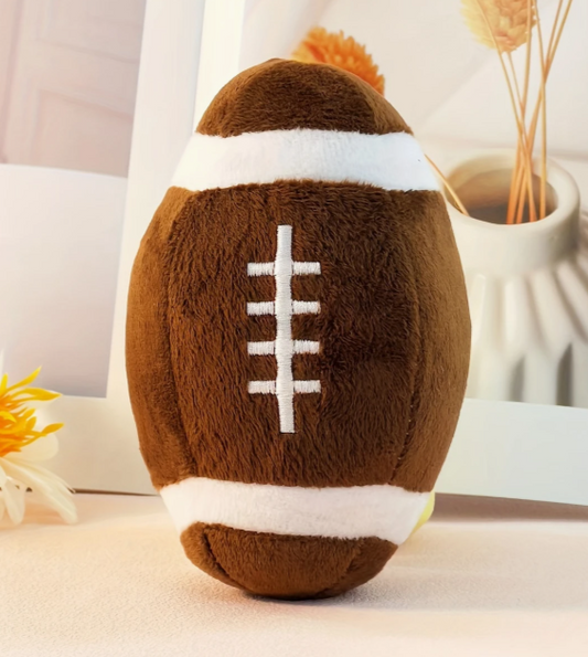 Schattige pluche rugbybal voor katten en kleine honden, gemaakt van zacht materiaal met sportief design.